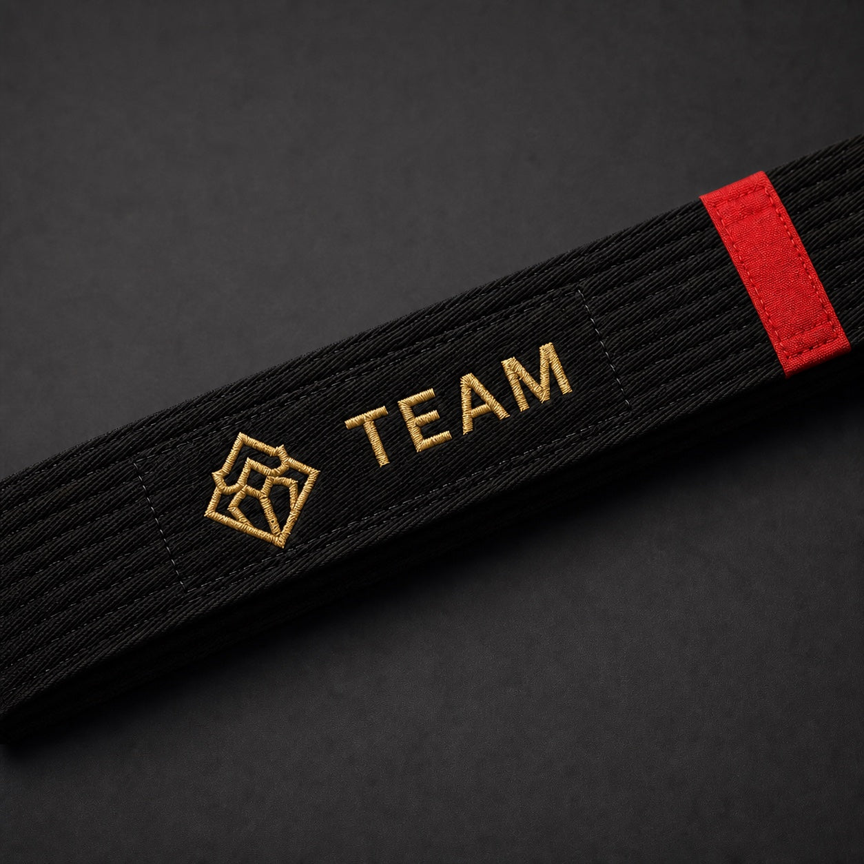 Academy logo embroidery on a custom belt